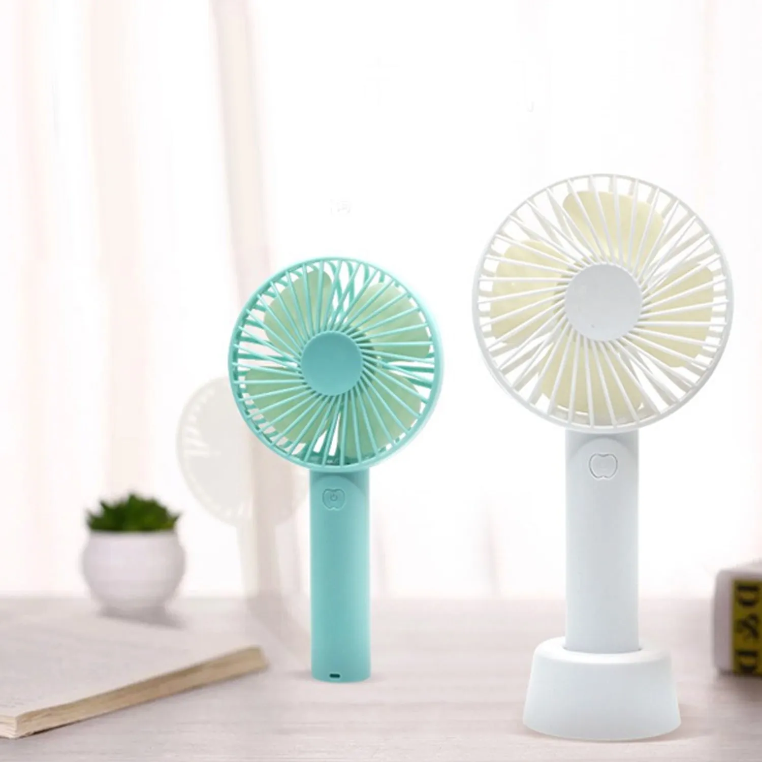 Portable Handheld Fan used in summers in all kinds of places including household and offices etc.(Battery Not Include)